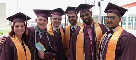 commencement students in cap and gown